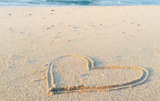 Heart drawn in the sand Photo by Khadeeja Yasser on Unsplash.com